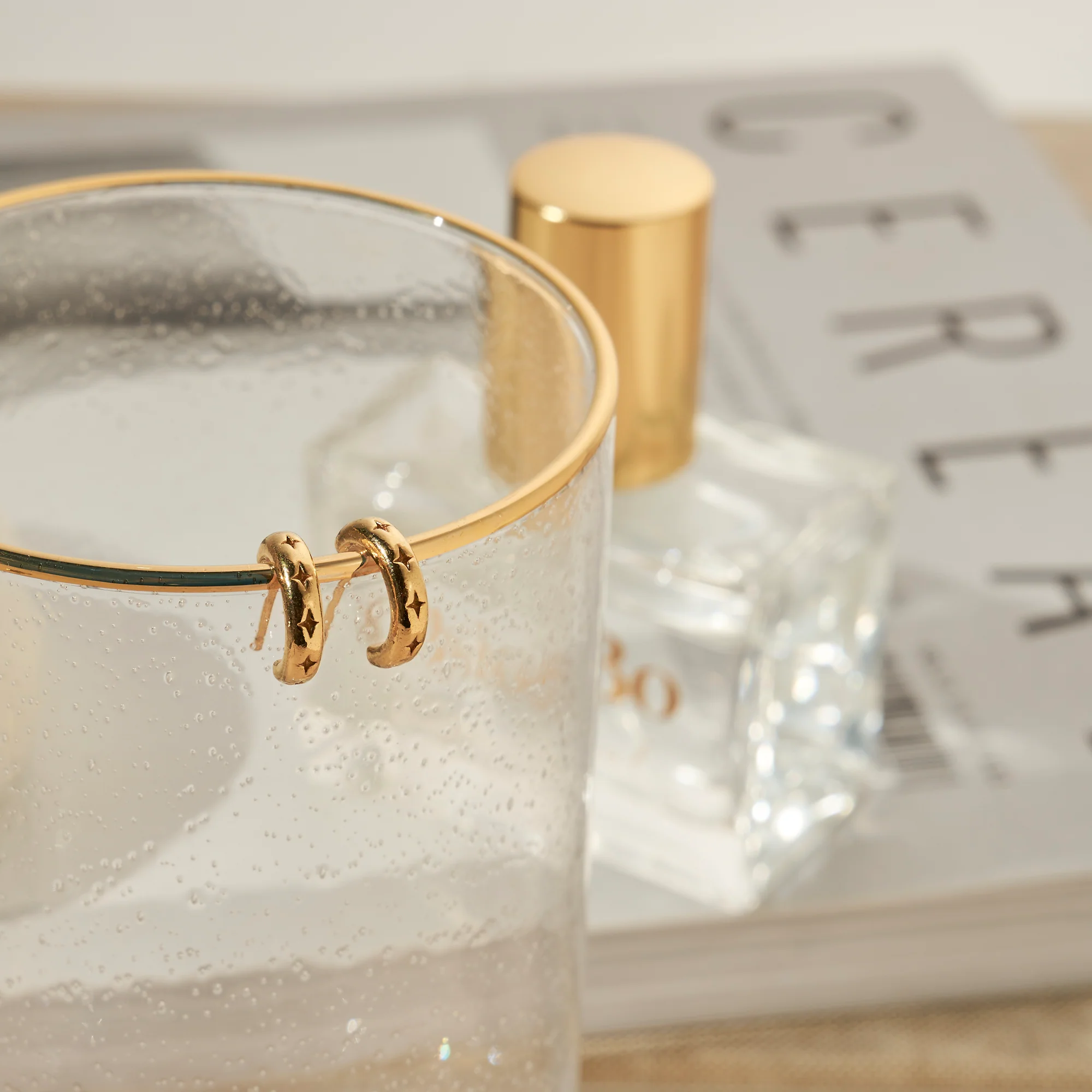 Cut Out North Star Huggie Hoops - Image 8